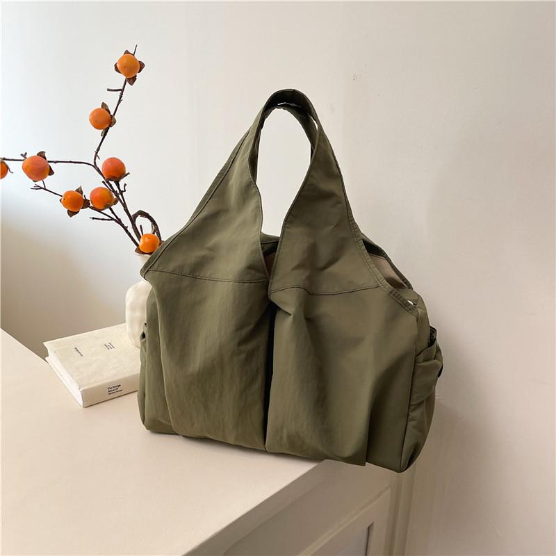 

Fashion trend casual simple texture large capacity tote bag summer new 2025 personalized women s shoulder bag зелёный