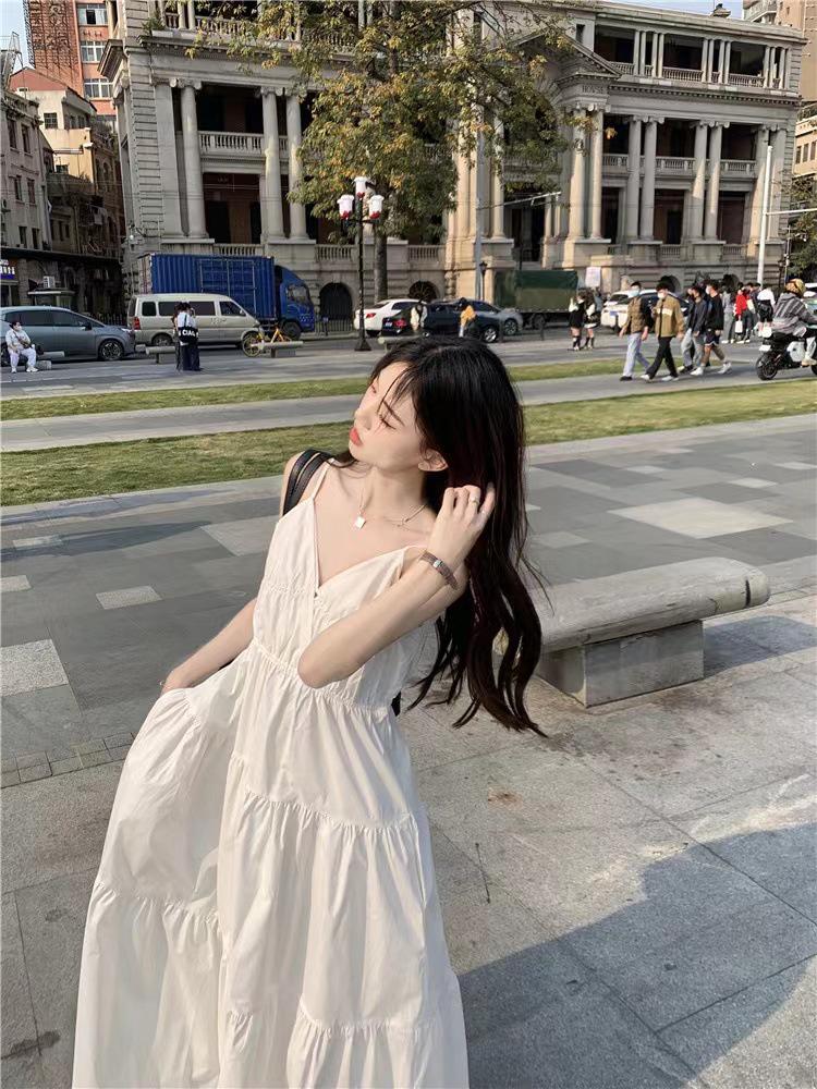 Elegant White Spaghetti Strap Summer Dress for Tall Women with Waist-Cinched Slimming Design and Flowing Mid-Length Hem