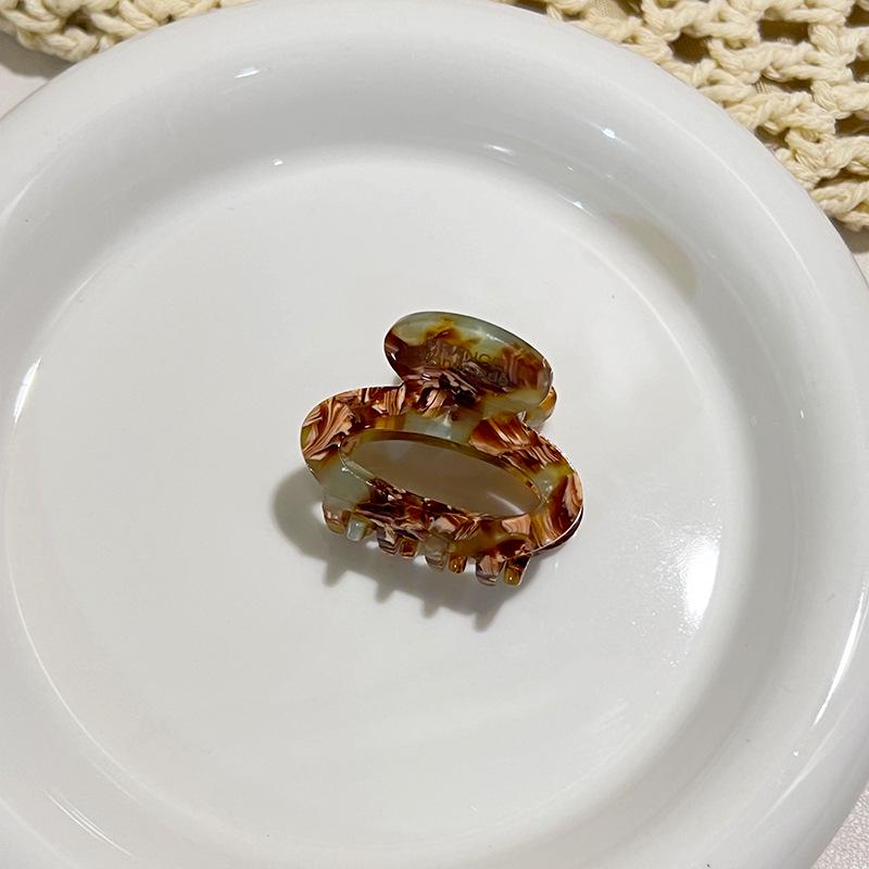 Acetate Floral Mini Claw Clip: Elegant Oval Hollow Design for High Ponytails & Side Styles
