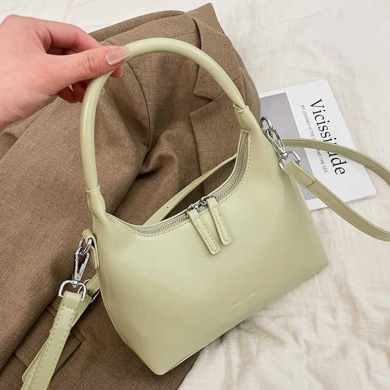 New Underarm Bag Women's Niche Portable Shoulder Bag Simple Sense Fashion Casual Hand Bag Crescent Bag