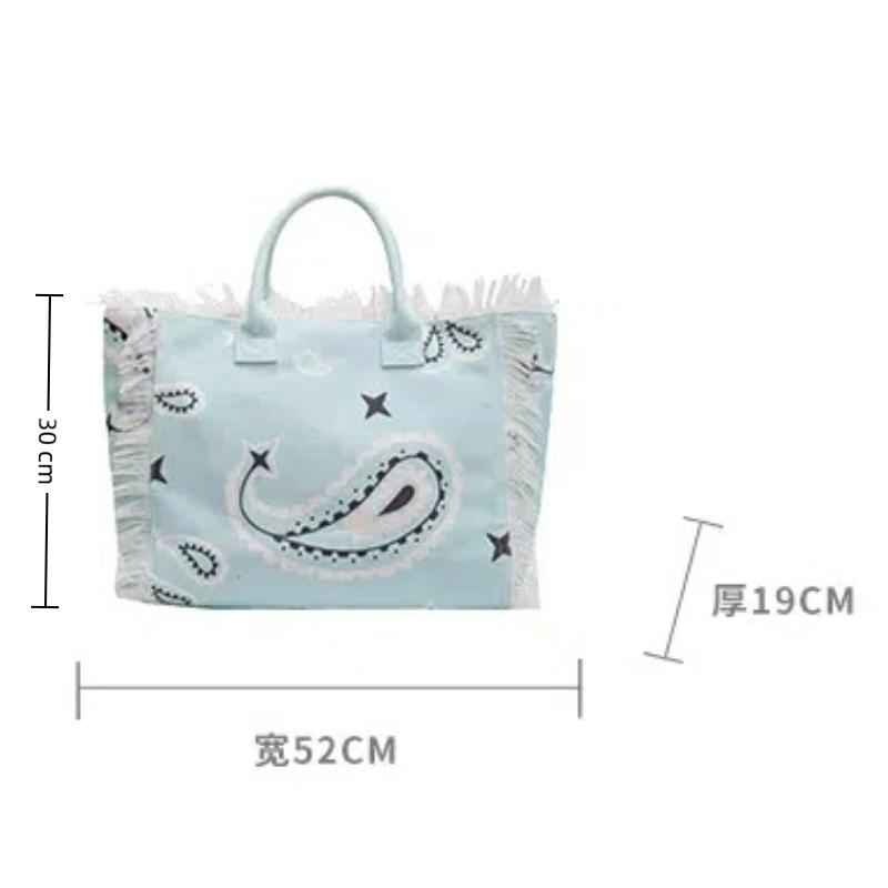 2026 Damen-Tragetasche für Reisen Strandtasche Große Kapazität Schulter-Pendlertaschen Hand-Quaste Jeans-Print Quaste Gespleißte Handtaschen