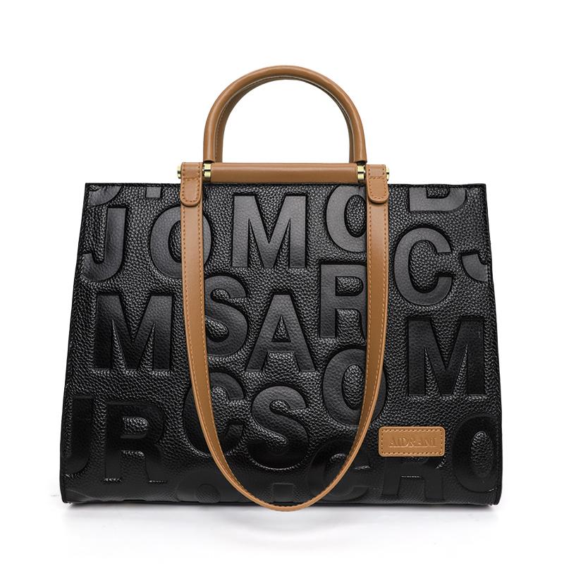 

Новая вместительная женская сумка с контрастным буквенным принтом и высококачественной воловьей кожей. Сумка для мамы.