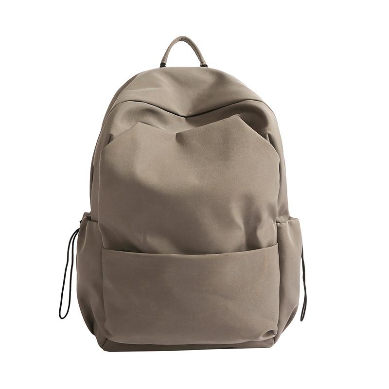 Junior high school backpack large capacity solid color backpack male simple versatile high school college student schoolbag female