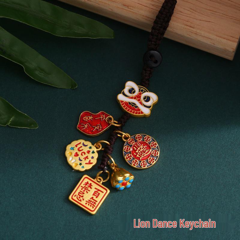 Goldener Glücksschlüsselanhänger: Reichtumsgott verschlingt Goldtier für Familie, perfekt als Auto- oder Handyanhänger.