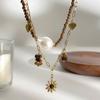 Pack of 2 Chic Stackable Flower Necklaces with Stainless Steel Chain and Simulated Pearls for Fashionable Look