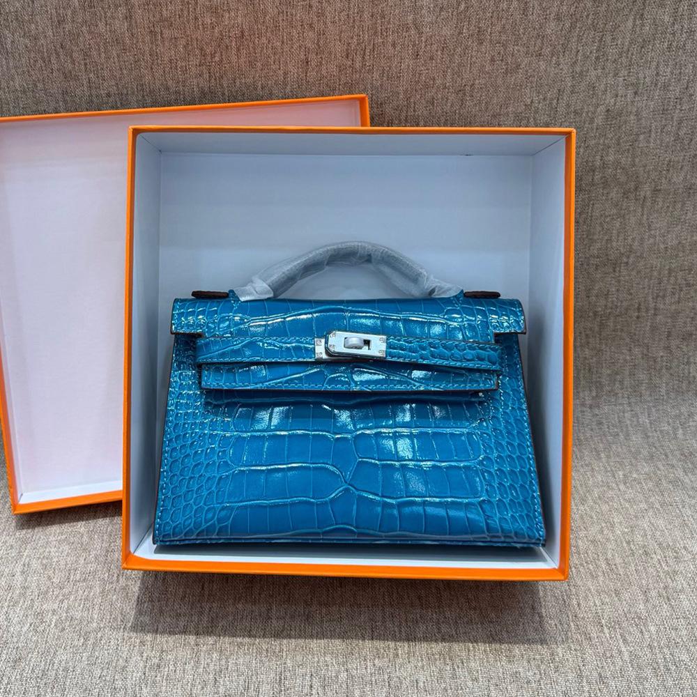 

Новая модная и универсальная сумка через плечо с цепочкой в виде свиного носа из натуральной кожи с рисунком крокодила и коровьей кожей первого поколения Length 22cm x Thickness 7cm x Height 14cm