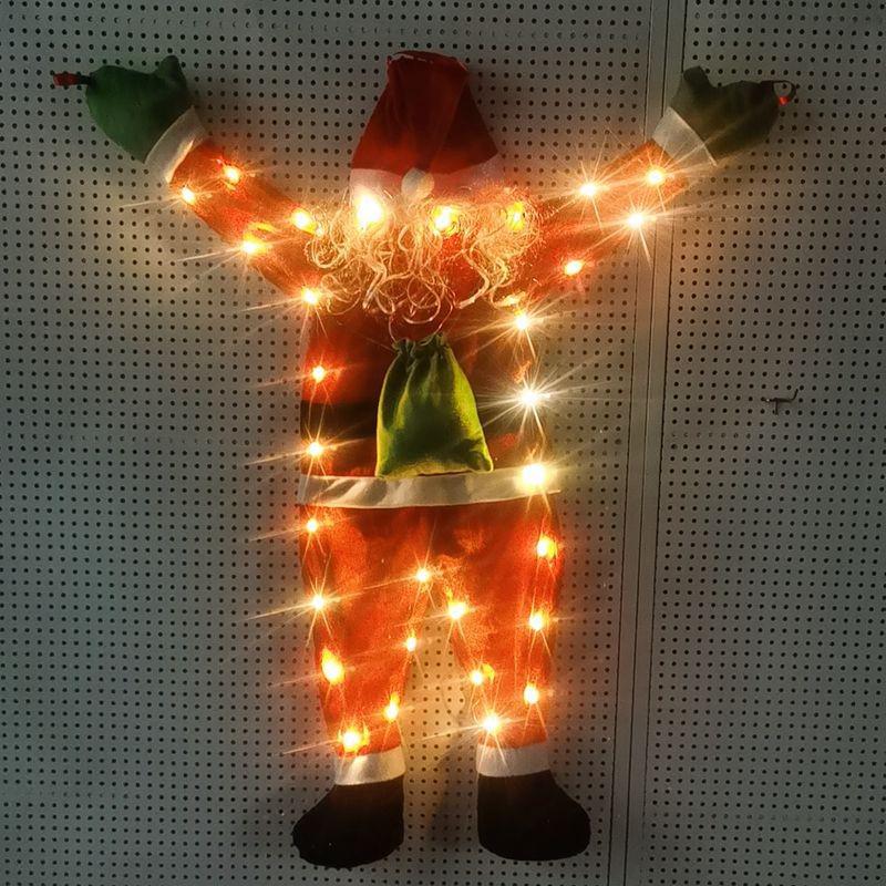 Grinch Santa Climbing Wall Christmas Ornament in Flannel