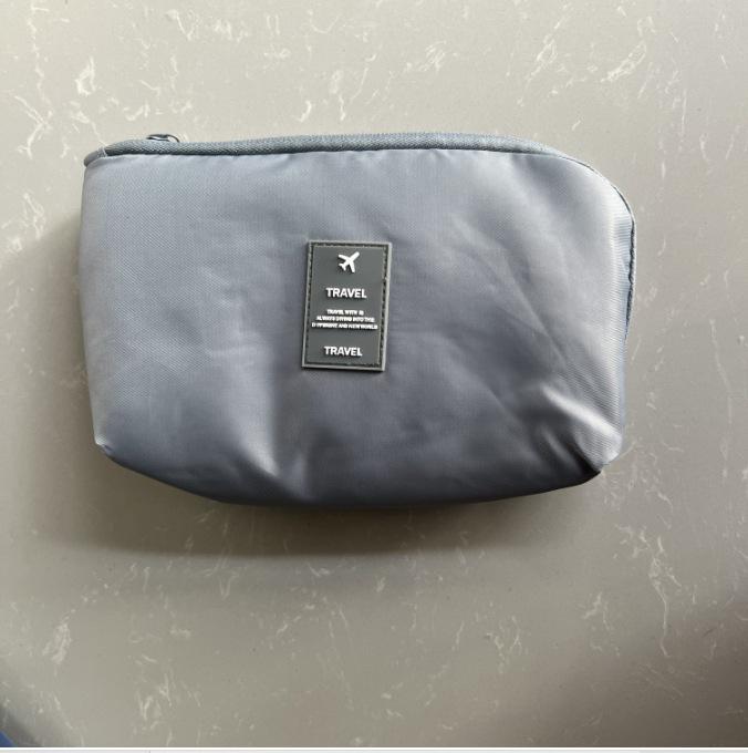 

Multifunctional Travel Organizer: Digital Storage, Data Cable, Charger, & Makeup Bag