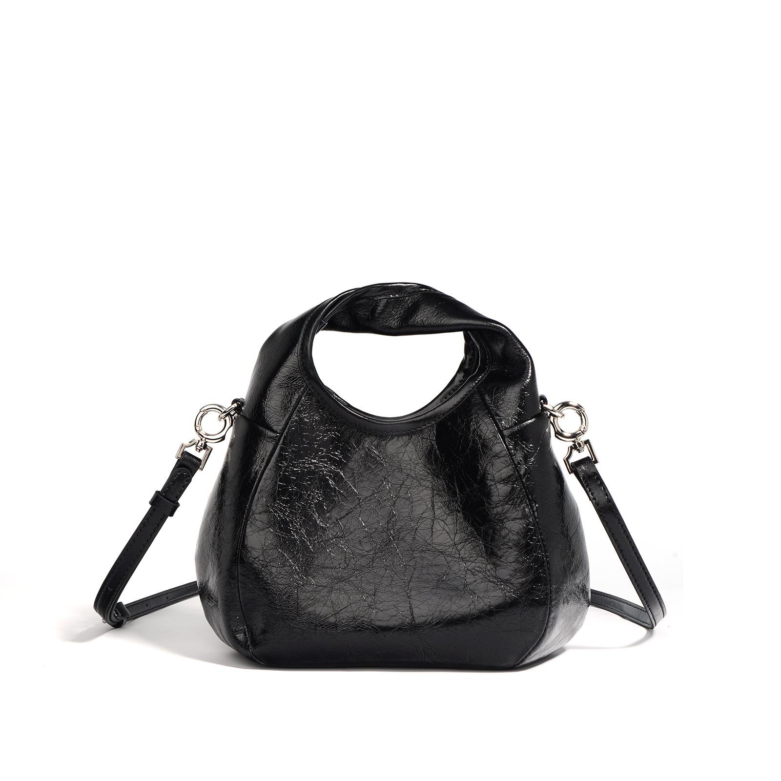 

2025 Новая высококачественная кожаная сумка через плечо Premium Sense с одним плечом для женщин, большая вместимость, универсальная, в стиле ретро для поездок на работу 23x12x18cm чёрный