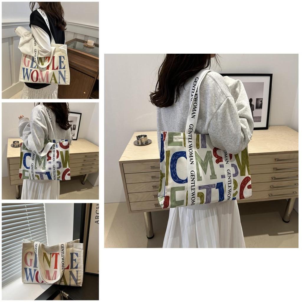 Large Capacity Stylish Canvas Tote Bag With Vibrant Letter Print Design For Everyday Use