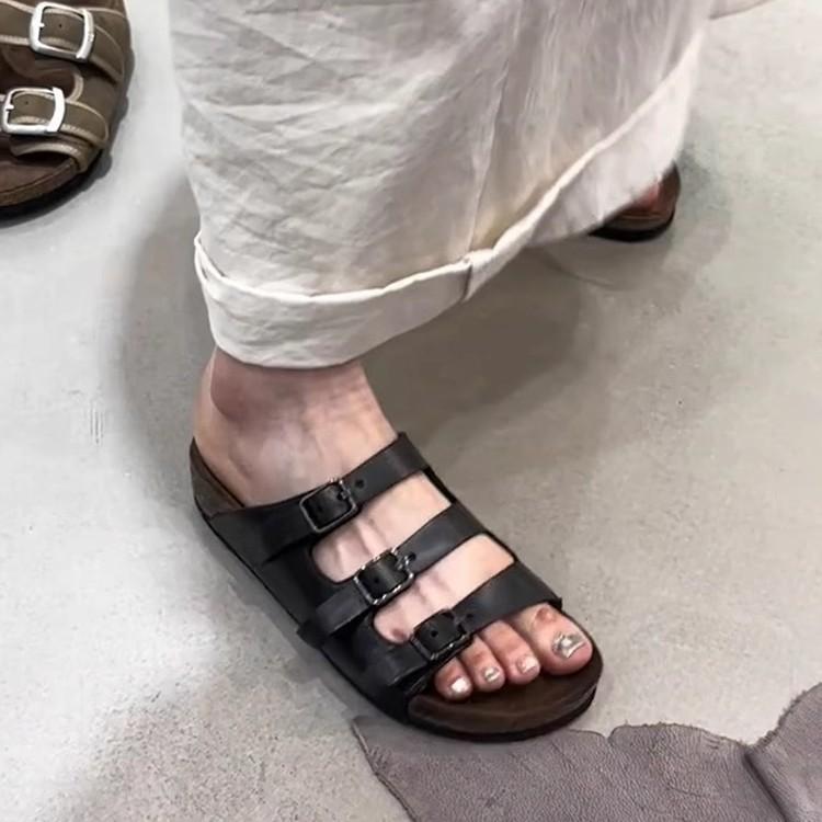 Soft leather version~ Retro belt buckle one-word slippers women's flat bottom versatile lazy people wear black beach shoes with one pedal