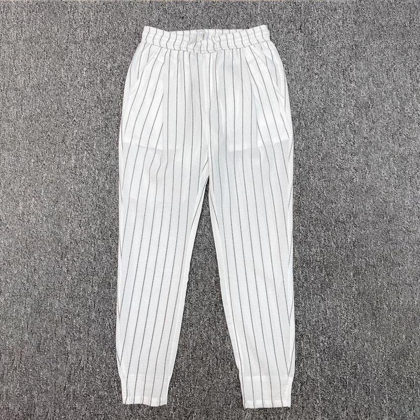 Letní pánské ležérní kalhoty s tenkým svislým proužkem v pase