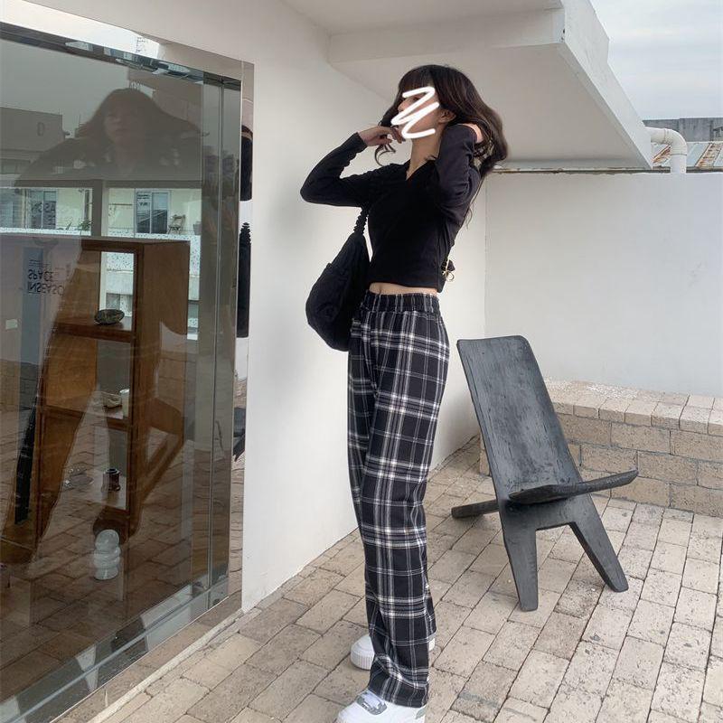 Spodnie zimowe w kratę z podszewką z polaru w panterkę, z wysokim stanem i szerokimi nogawkami