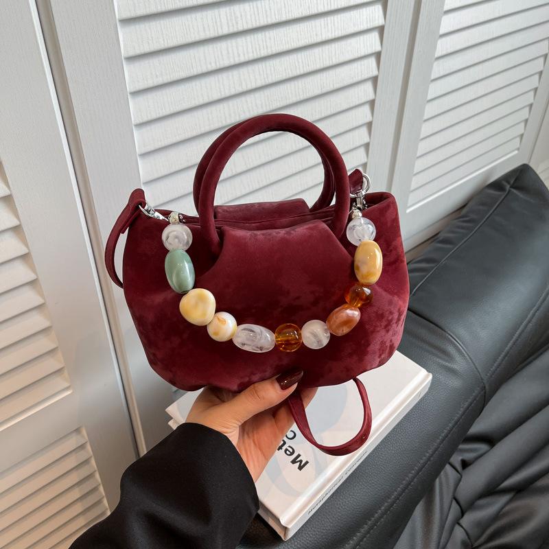 Niche bag women's new summer versatile messenger bag casual pleated portable bucket bag