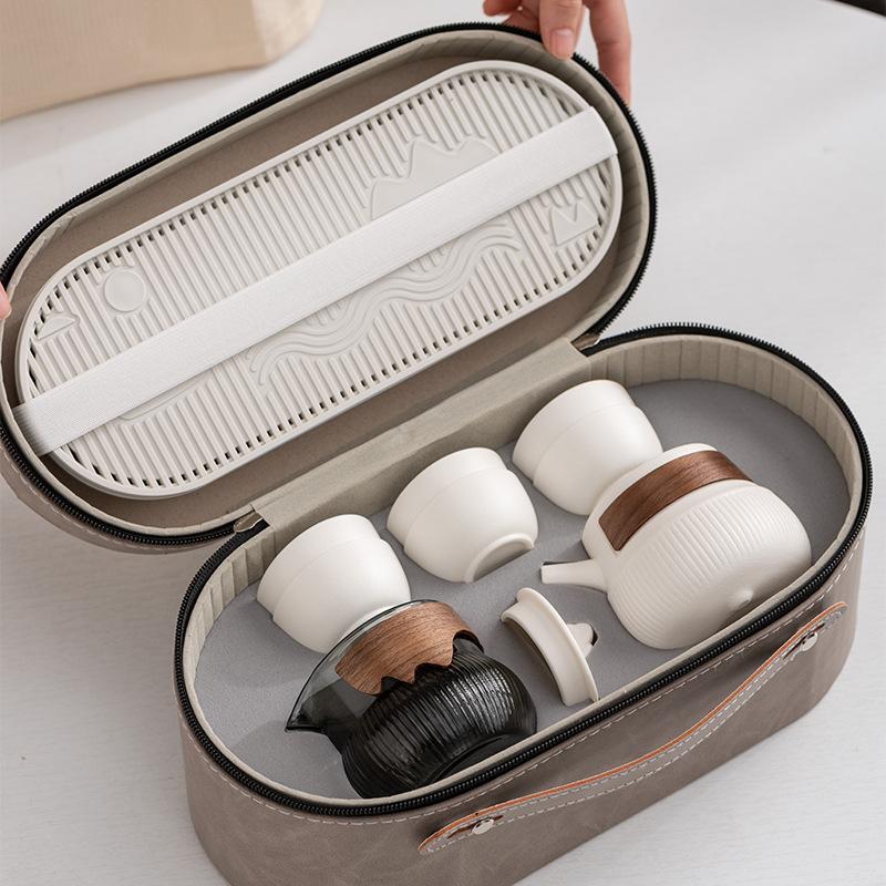 Tragbares Kung Fu Reise-Teeset Speckjade Porzellan High-End Business Teekanne Teetasse Geschenke Leichter Luxus Ein Kännchen Sechs Tassen
