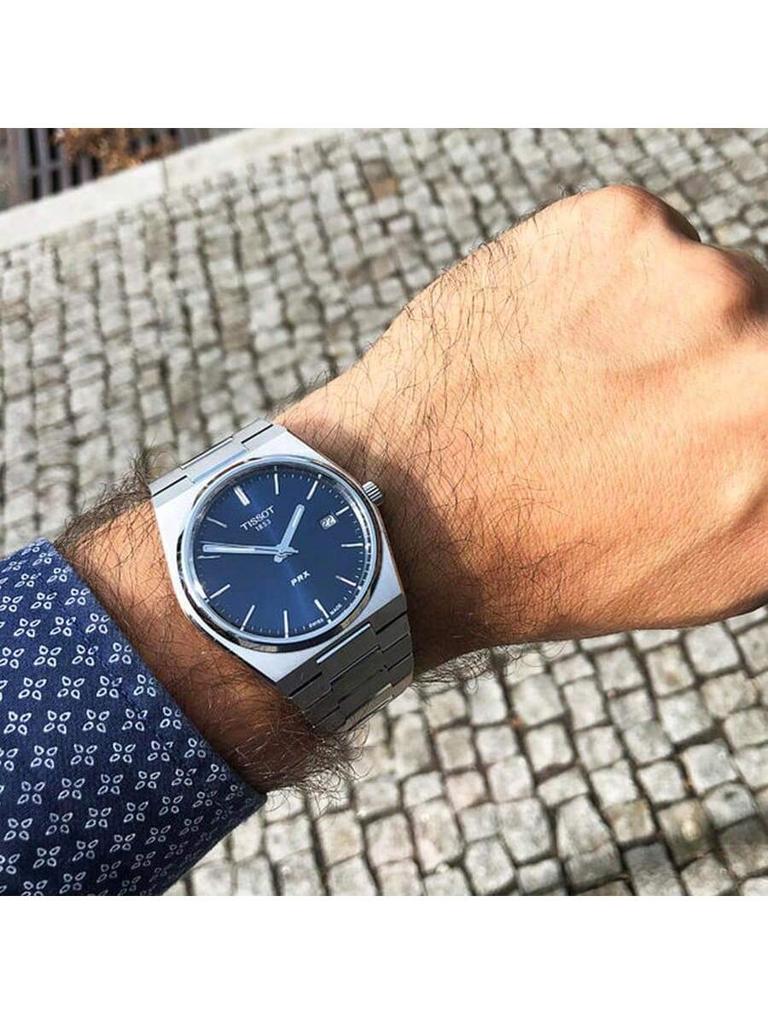 PRX T137.410.33.021.00 Stylish, Elegant Stainless Steel Quartz Men's Watch with Golden Round Dial Date Display. Men's T137.410.11.041.00