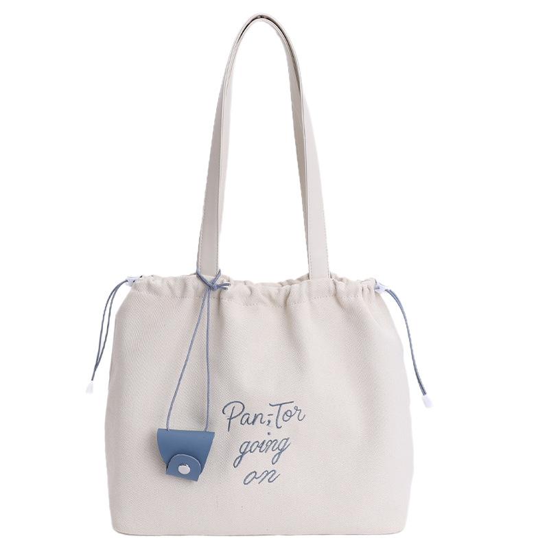

Summer new large-capacity tote bag women s fashion versatile shoulder bag simple class commuter canvas bag one size fits all білий