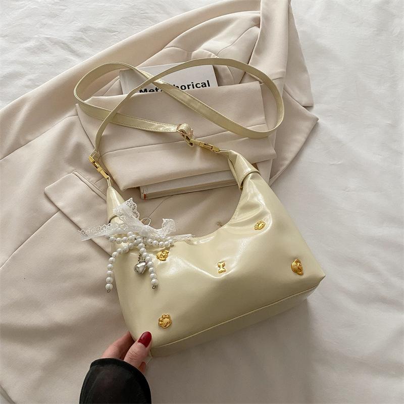 Super fire small bag women 2025 new foreign versatile messenger bag popular this year Korean women's dumpling bag