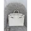 Togo primo strato pelle di mucca borsa platino motivo litchi fibbia argentata borsa a mano serratura di alta gamma borsa a tracolla messenger in pelle da donna