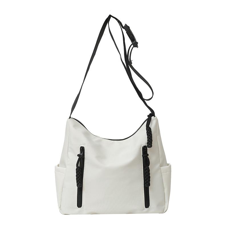 Fashion and leisure large-capacity bags Women's spring and summer new canvas bags Students commute to class Versatile oblique