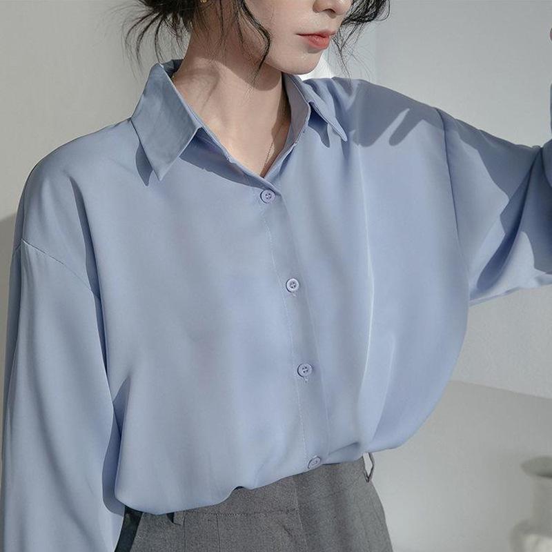 Elegant Loose White Shirt for Women - Spring & Autumn, High-End French Design with a Professional, Slightly Mature Hong Kong Style.