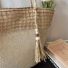 Woven Straw Tote Bag with Beaded Tassel and Open Top Design for Summer Beach or Casual Daily Use