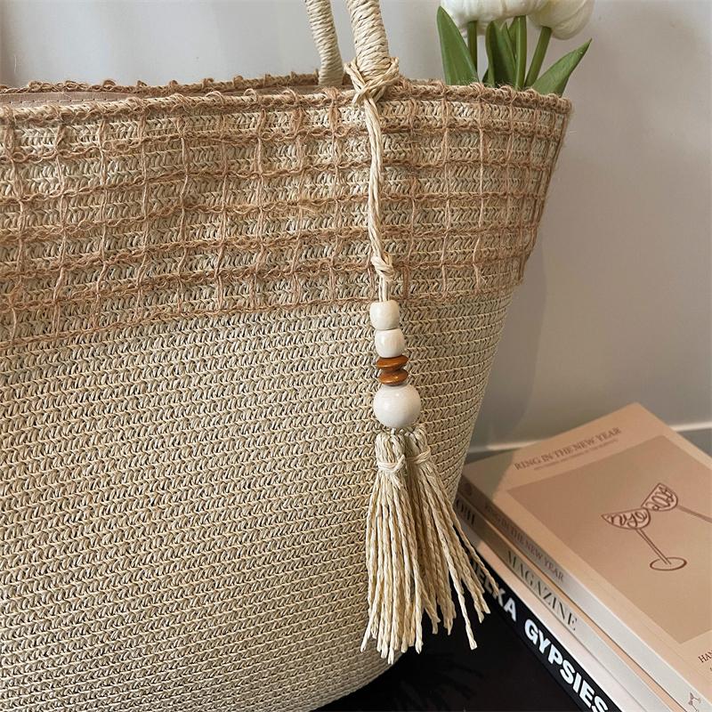 Woven Straw Tote Bag with Beaded Tassel and Open Top Design for Summer Beach or Casual Daily Use