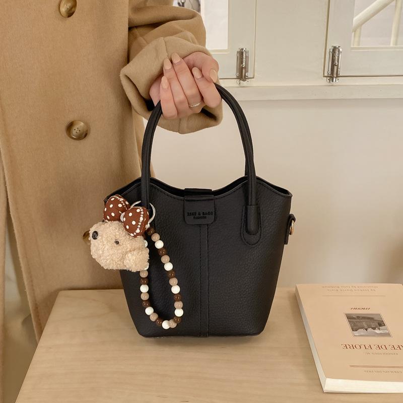 Einfache lässige tragbare Beuteltasche Damen Frühling neuer Modetrend Nischentextur Schulter Umhängetasche