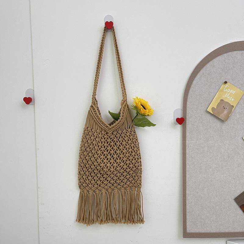 Hollow Cotton Thread Woven Bag 2025 New Single Shoulder Tassel Straw Bag Vacation Wind Beach Bag Versatile Underarm Women's Bag