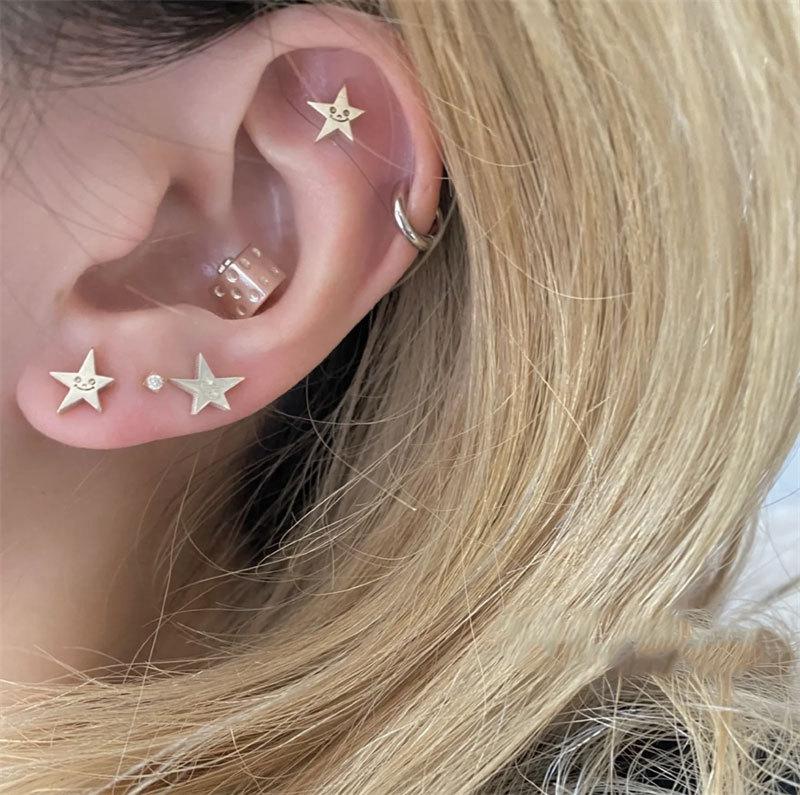 Girls Sweet and Cool Cute Smiling Face Five-pointed Star Earrings Mini, Small and Cold Style New Style