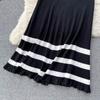 Autumn And Winter Korean Version Of The Collision Color Stripes Hollow Knitted Cardigan Plus Half-Body Skirt Two-Piece Set