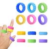 Spielzeug 6 Stück Sensorische Fidget Fingerringe für Silikon-Textur Stress Neuheitsgeschenke Partygeschenke Klassenzimmerpreise Kinder