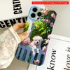 2DFlat Sunlit Puppy Behind Pink Flower Fence All Inclusive Film Hard iPhone Case, Compatible with iPhone 18 Pro Max 17 16 15 14 13 12 11