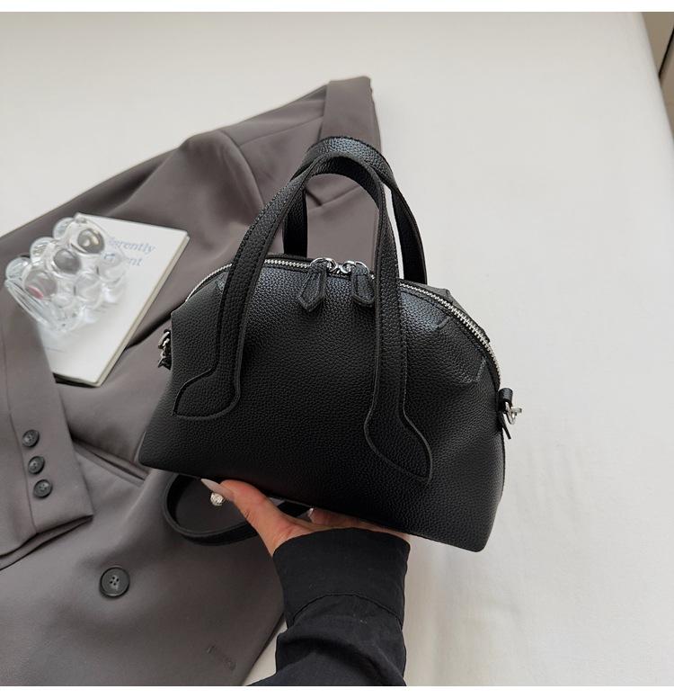 Vintage niche portable shell bag women's 2025 new fashion lychee pattern bowling bag commuter shoulder messenger bag