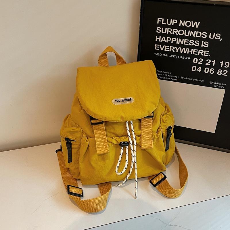 Korean Version of Casual Art Canvas Schoolbag Fashion Nylon Drawstring Backpack 2025 Summer New Fashion Simple Solid Color
