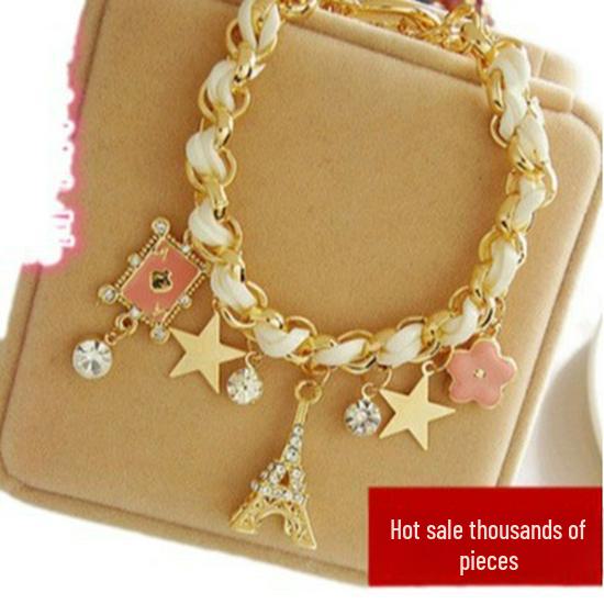 E053 European & American Braided Leather Bracelet with Iron Tower, Star, and Flower Charms