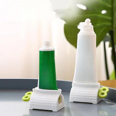 Convenient Toothpaste Dispenser Rolling Toothpaste Squeezer Stand Holder Bathroom Accessorie