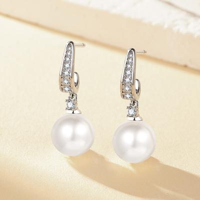 Korean Version of Temperament Fashionable Gentle Versatile Diamond Water Drop Pearl Earrings Women's Personality Light Luxury Design Earrings 2026