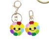 Bunte Sonnenblumen-Smiley-Gesicht Schlüsselanhänger & Handgefertigter Taschenanhänger - Ohrhörerhüllen-Dekoration für Damen & Kindertag Geschenk