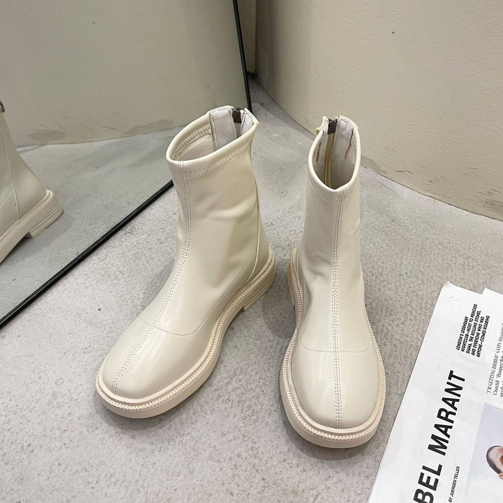 Martin boots spring and autumn new flat bottom round head thin boots with skirt short boots women