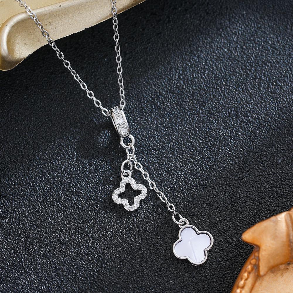 European & American Luxury Tassel Hollow Mother-of-Pearl Clover Pendant Diamond Necklace for Women - High-End Fashion Jewelry