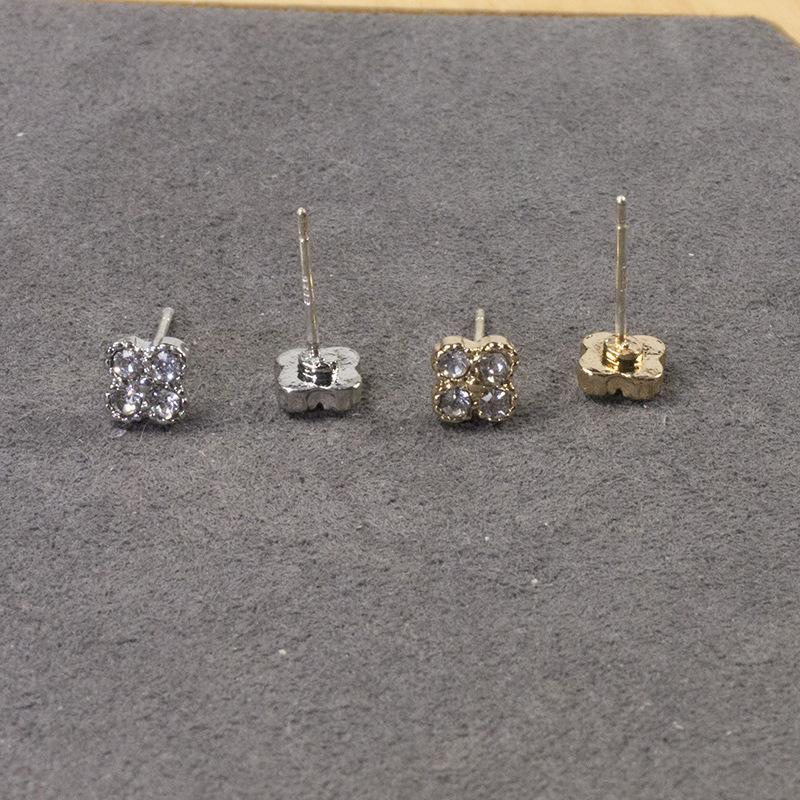 Silver needle four-leaf clover high-end stud earrings set temperament zircon simple women's small exquisite cold wind earrings
