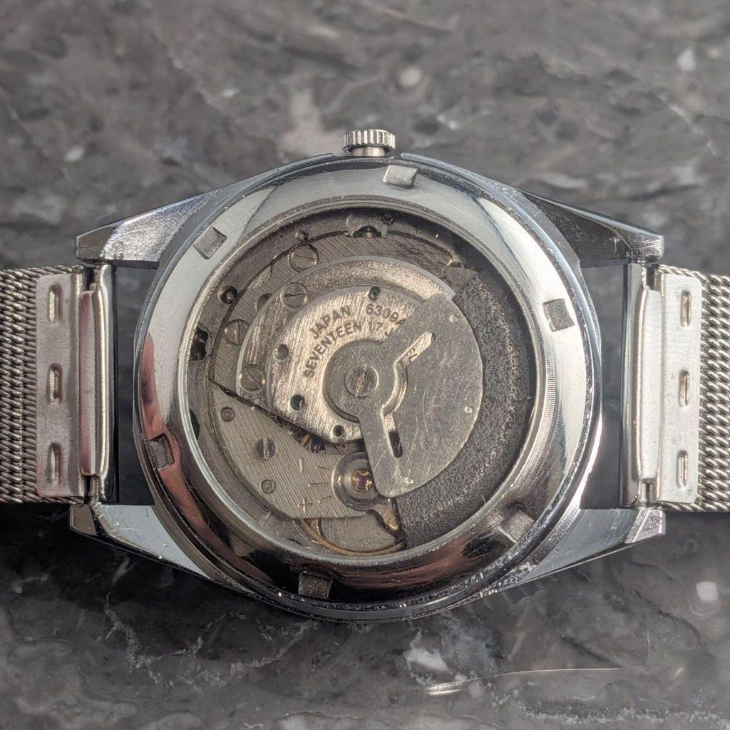 Used SEIKO Automatic Vintage Black Dial Bar Index 3-Hand Day-Date See-Through Case Back Men's Watch