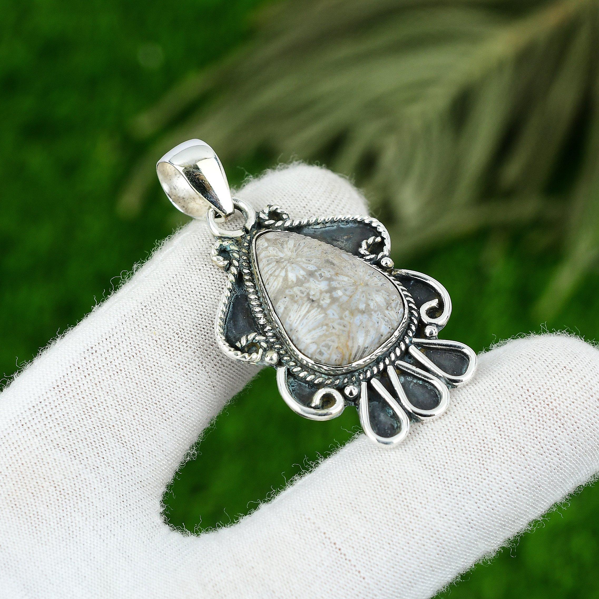 

Natural Fossil Coral Sterling Silver Sister Ethnic Art Deco Root Chakra Pendant