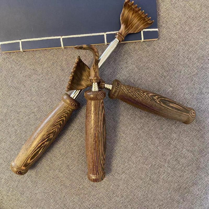 Ausziehbarer Wengeholz-Rückenkratzer