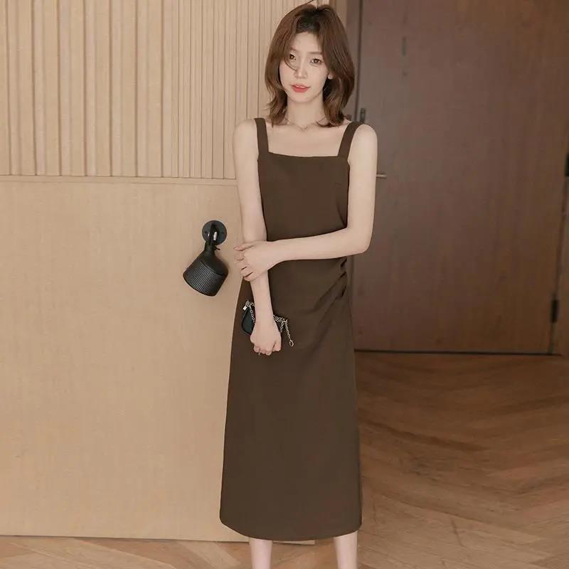 Small grain suspender dress women's spring and summer high-end small black dress covering meat and showing thinness small man long skirt