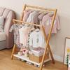 Compact Kids' Floor Clothes Rack: Foldable, Short, and Perfect for Bedrooms & Drying.