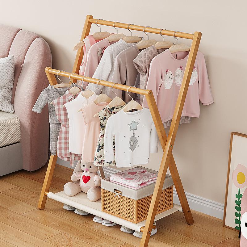 Compact Kids' Floor Clothes Rack: Foldable, Short, and Perfect for Bedrooms & Drying.