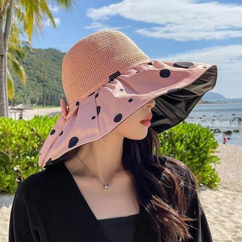 Spring and summer hat women's vinyl bow sun hat hollow breathable straw hat big brim face covering sunscreen bucket hat