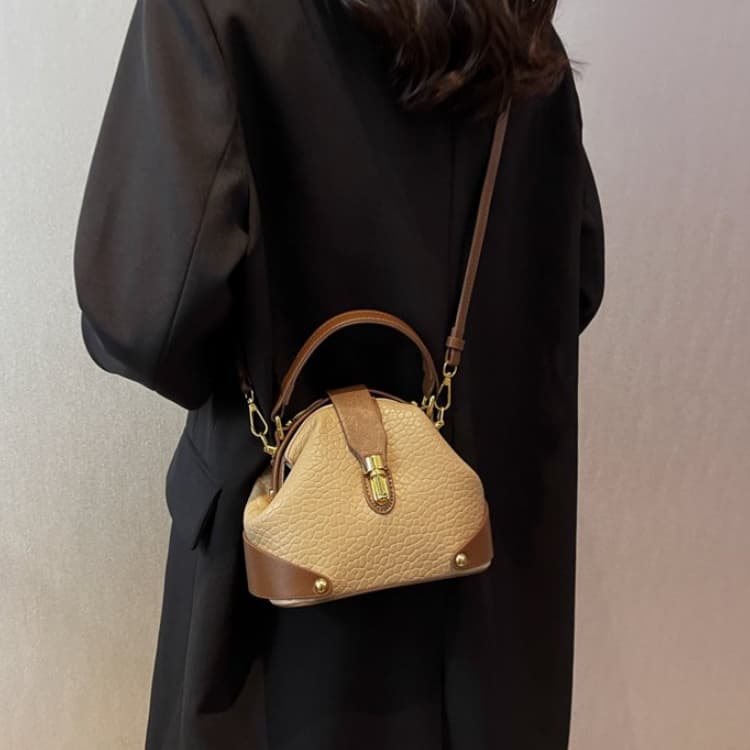 Retro Semi-round Soft Leather Rivet Corner Commuting Niche Texture Handbag
